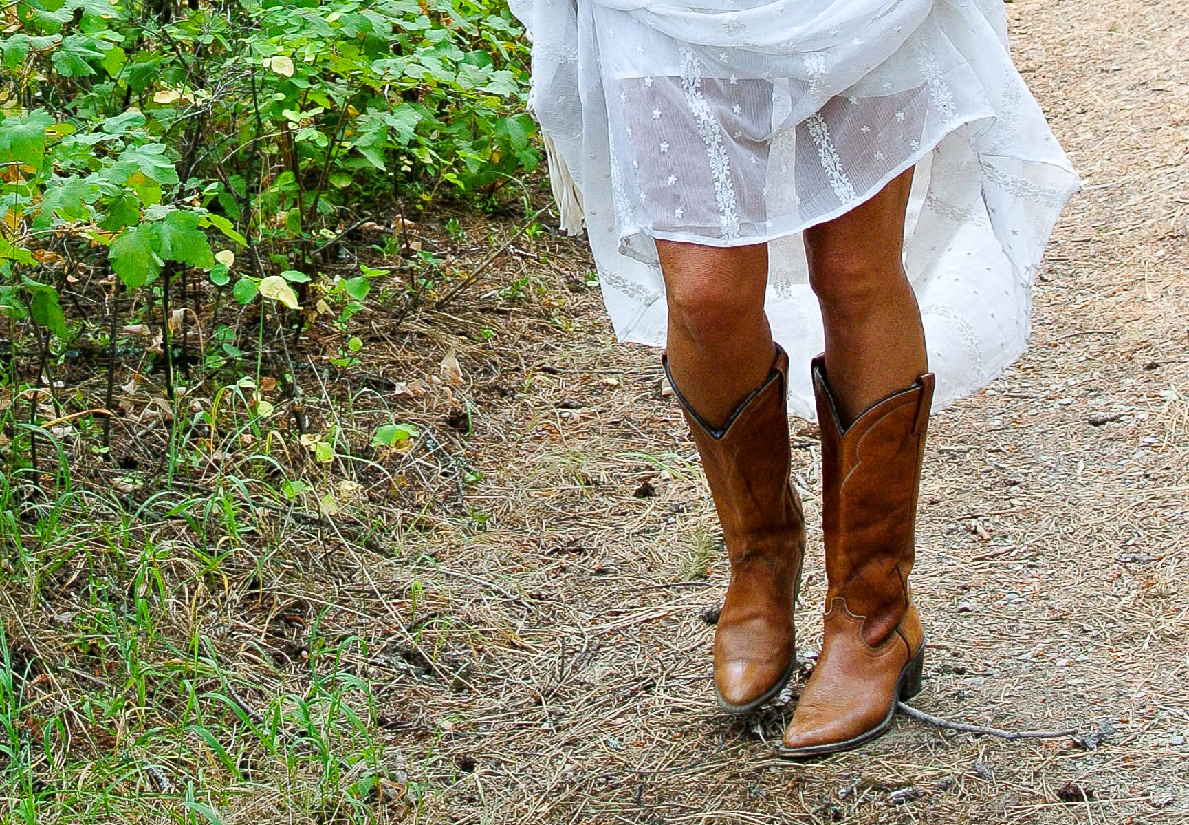 white sundress with cowboy boots